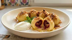 Knedle ze śliwkami jak u babci: miękkie ciasto ziemniaczane i soczysty środek